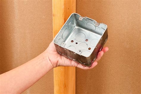 how to knock out tabs in a junction box|remove knockouts from electrical boxes.